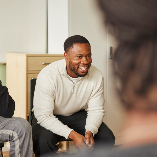 man in group therapy