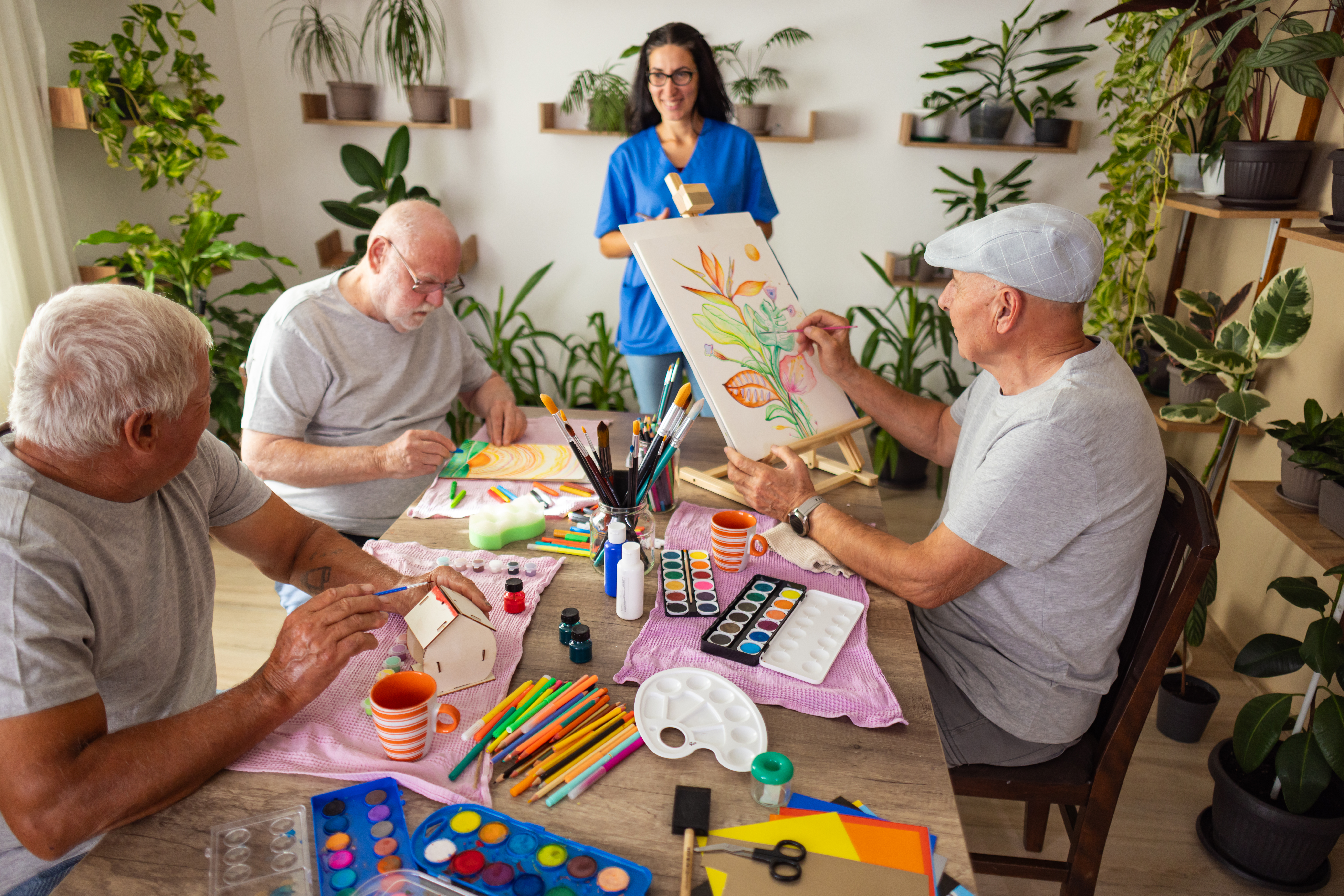Seniors enjoying art therapy Programs & Services